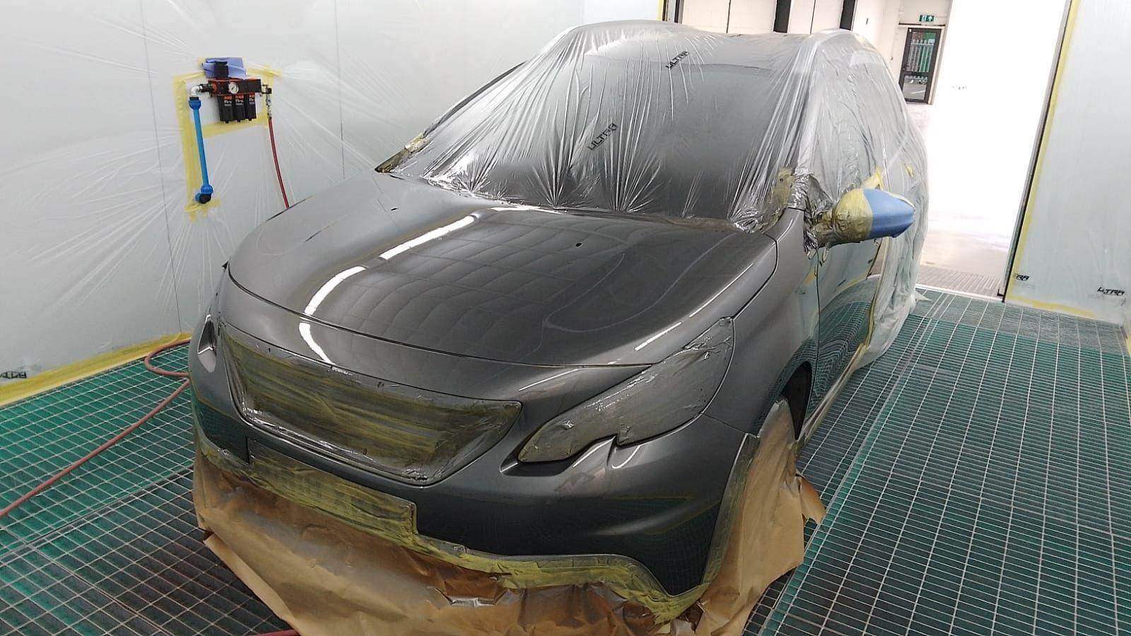 A car masked up ready for paint